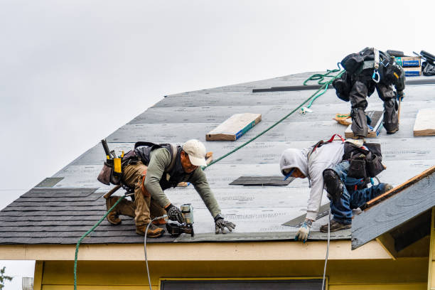 Professional Gutter Installation technician working in Rochester, NH
